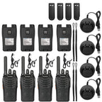 Set of walkie-talkies with accessories on a white background