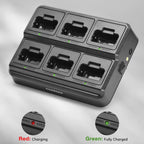 Black battery charger with six slots on a gray background
