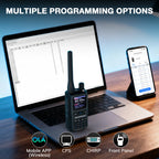 Laptop with UV-5G Mini and smartphone displaying programming options on a desk.